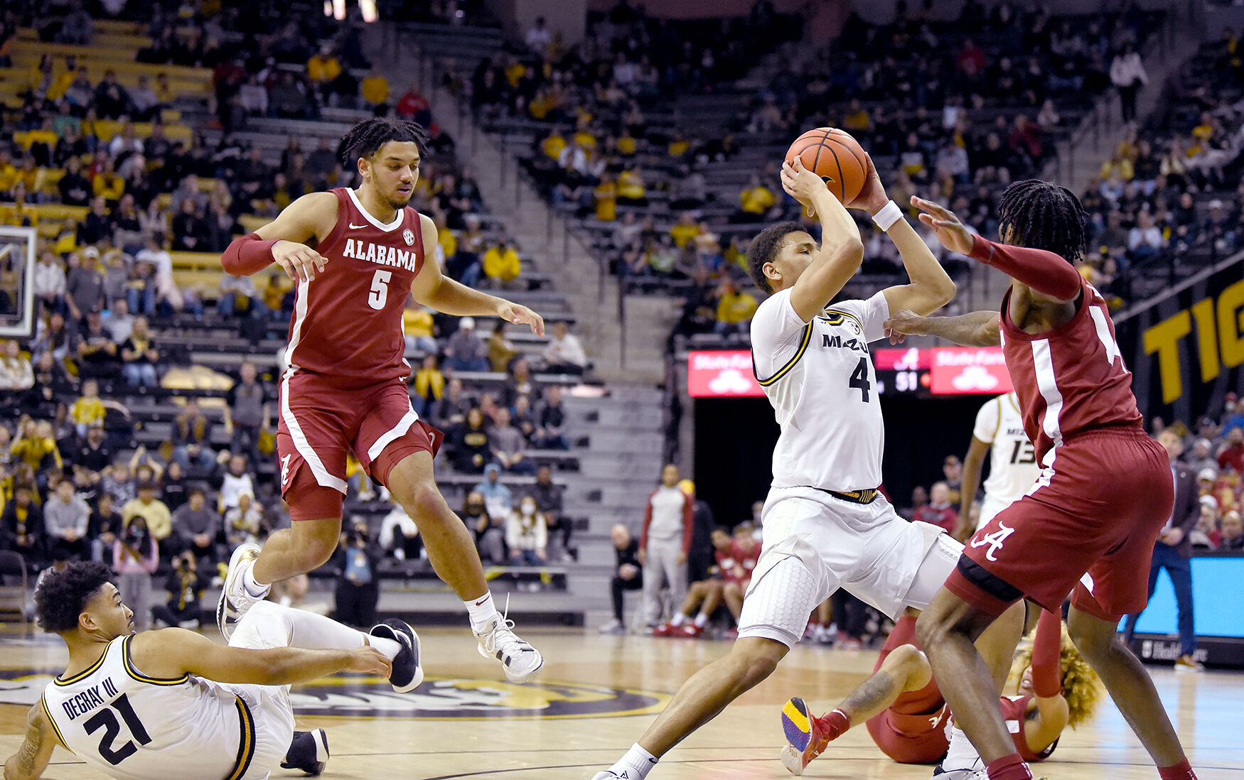 Missouri senior Javon Pickett attempts to keep the ball away